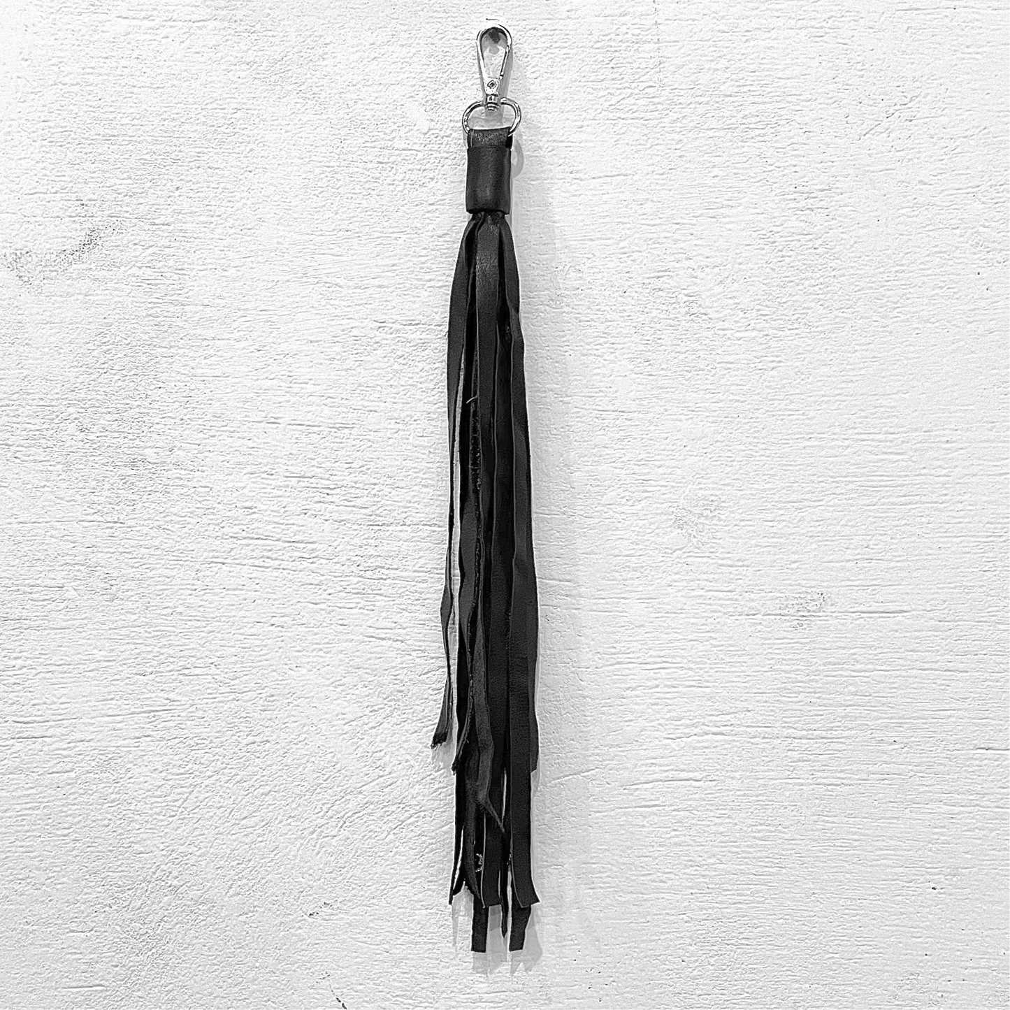 “NOMAD” leather keychain