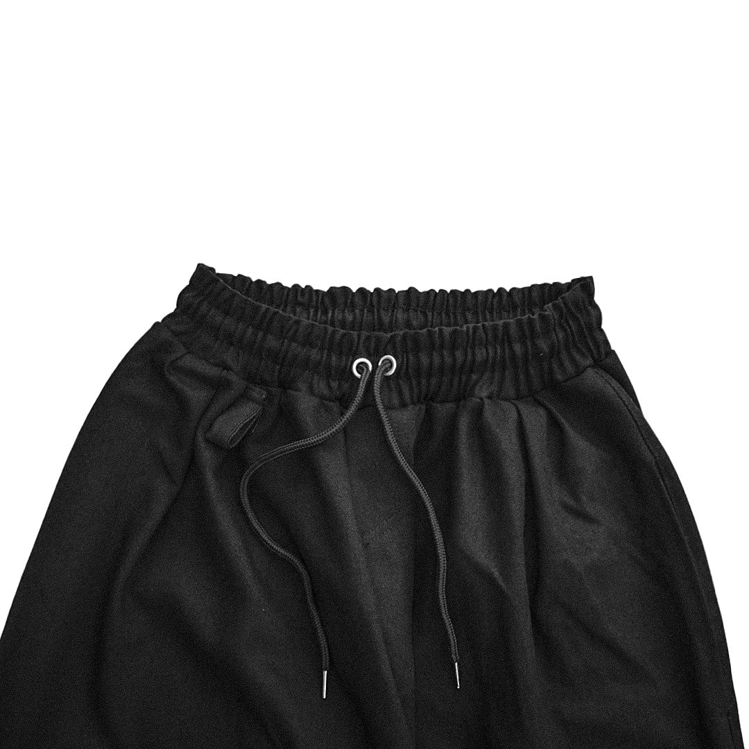 “RIOT” trousers