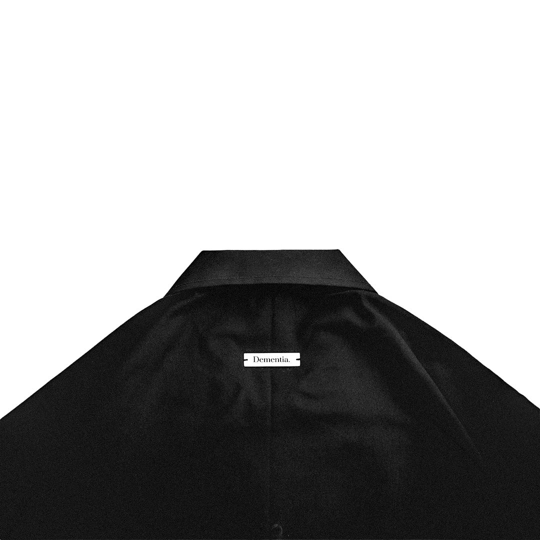 “CONSUMED” button down shirt